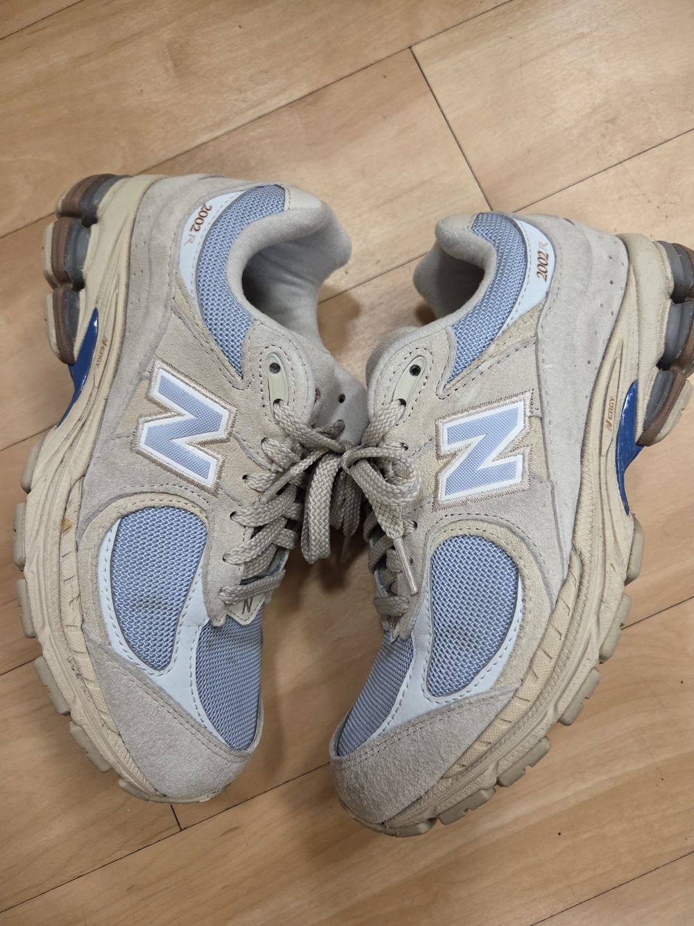 New Balance 2002R Sneakers in Light Blue and Beige